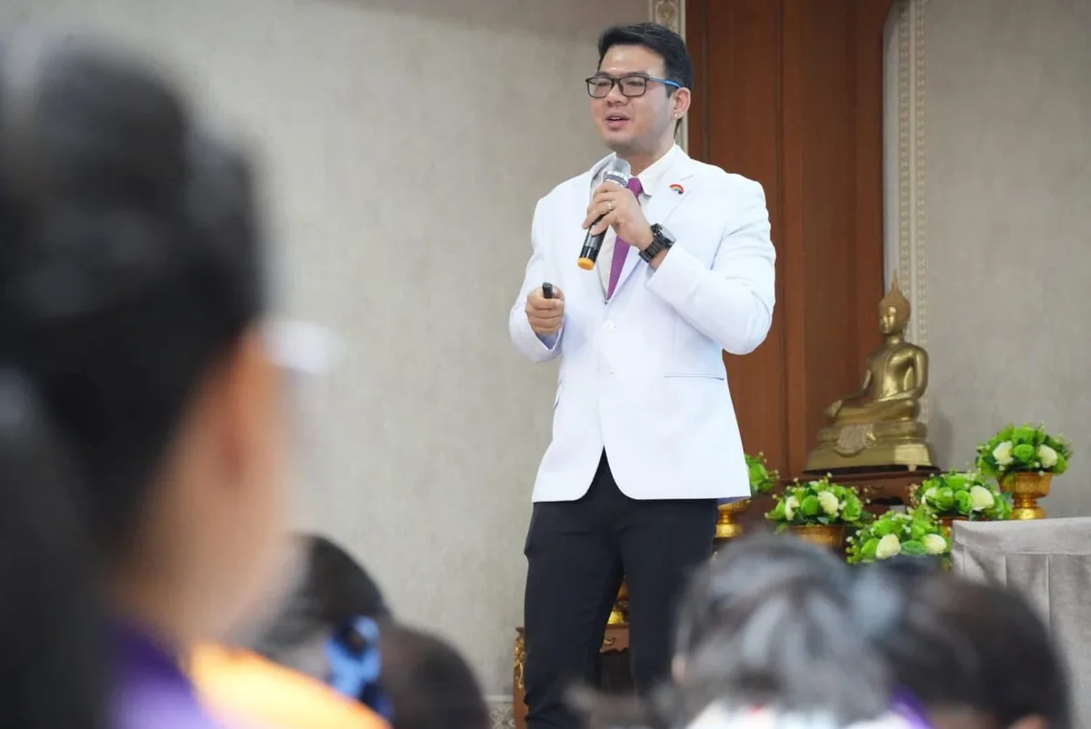 Dr. Kris giving an educational talk