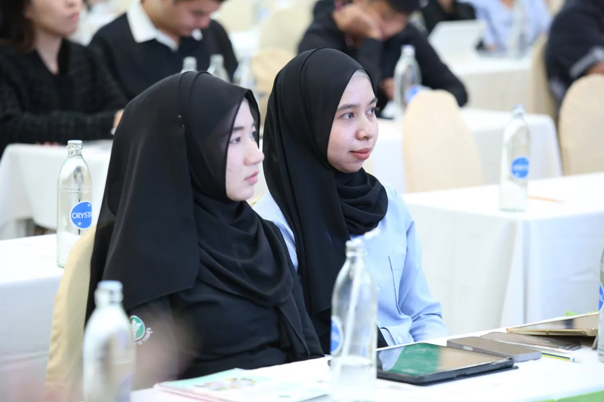 Participants listening to the talk
